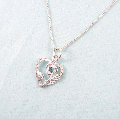 Click here to buy Sterling Silver Heart & Rose March Birthstone Necklace.