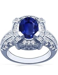 Platinum Oval Cut Blue Sapphire Ring With Sidestones (GIA Certificate)