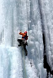 Detail of an Ice Climber in New York's Adirondack Mountains - Dramatic Photographic Print by Brendan Reals