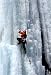 Detail of an Ice Climber in New York's Adirondack Mountains - Dramatic Photographic Print by Brendan Reals