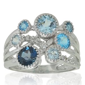 10k White Gold Blue Topaz and Diamond Ring (.06 cttw, I-J Color, I1 Clarity),... by Amazon.com Collection