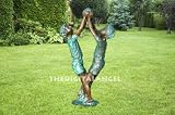 boys playing with ball statue fountain or pond use new