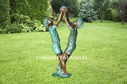 boys playing with ball statue fountain or pond use new