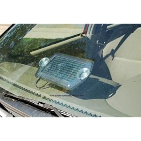 Windshield SunPlug car-battery Maintaining Solar Charger. 1.5W solar panel that charges 12V lead acid car battery under the windshield.