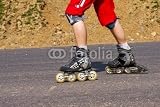 Wallmonkeys Peel and Stick Wall Decals - Young Woman on Rollerskates - Removable Graphic