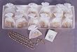 Rosary Display with 12 Wedding Gift Packages, Each with Rosary and Gift Card