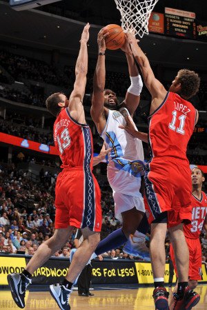 New Jersey Nets v Denver Nuggets: Nene, Kris Humpries and Brook Lopez Photographic Poster Print by Garrett Ellwood, 24x36