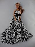 A Long and Flowing Gown in Black and White with Long Train Made to Fit the Barbie Doll