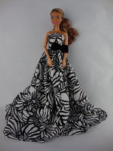 A Long and Flowing Gown in Black and White with Long Train Made to Fit the Barbie Doll