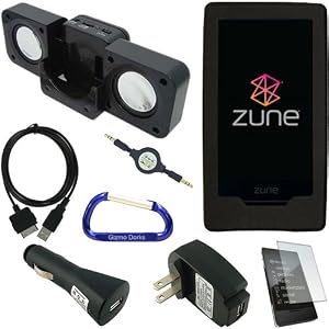 Combo Pack for the Microsoft Zune HD MP3 Player: Black Rubberized Silicone Skin Case, Foldable Cube Speaker Dock, USB Data Sync Charging Cable, USB Car Charger, USB Wall Travel/Home Charger, 3.5mm Auxiliary Stereo Retractable Cable, Screen Protector, and Free Carabiner Key Chain
