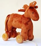 Review FurniToys  / A Pull Along Horse with removable wooden wheels so it doubles up as a cuddly soft toy as well. How clever is that?