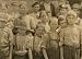1912 child labor photo The smallest boy is a band boy, next is a doffer. The smallest girl is a spin