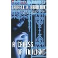 A Caress of Twilight (Meredith Gentry, Book 2) by Laurell K. Hamilton and Laural Merlington