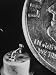 Dime Used to Illustrate Miniature Size of the Diode of an Injection Laser Photographi...