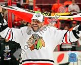 Dustin Byfuglien with Chicago Blackhawks Flag 2010 Stanley Cup Final - 8x10 Photo