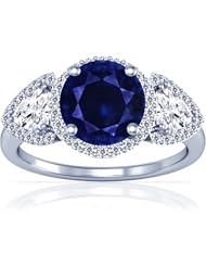 18K White Gold Round Cut Blue Sapphire Ring With Sidestones