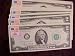 1976 U.S. two dollar bill, crisp, uncirculated, with postmark picture