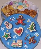 Scott's Cakes Taffy, Pretzel Brittle, and Peanut Butter Pretzel Nuggets Combo in a Christmas Cookie Tin
