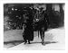 Historic Print (L): [Charles Evans Hughes walking with his wife]