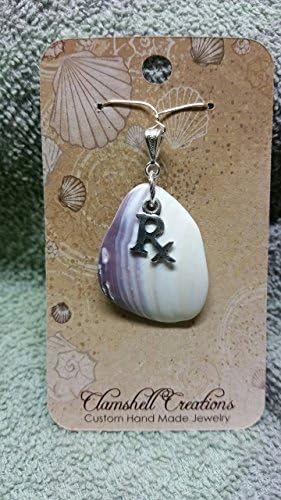 Pendant polished clamshell with RX charm