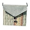 ArtisanStreet's Red and Green Flap Bag. Purse Two Complimentary Patterns of Gray and White Tweed. Closes with Silver Lion's Head Motif Button. Includes 43 Inch Shoulder Strap. Handcrafted, One of a Kind.