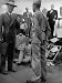 Discharged Gi Looking at New Suit Fashions Photographic Poster Print by Nina Leen, 12...