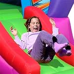 11FT Space Shuttle bouncy castle, showing girl sliding down ramp