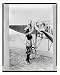 Historic Print (M): Harriet Quimby turing over plane propeller