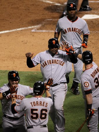 Texas Rangers v. San Francisco Giants, Game 5: Cody Ross, Juan Uribe, Edgar Rentaria, Aaron Rowand Photographic Poster Print by Stephen Dunn, 18x24