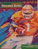 1991 Miami Hurricanes National Champions autographed 1992 Orange
Bowl program (Dennis Erickson, Ryan McNeil & Kevin Williams)