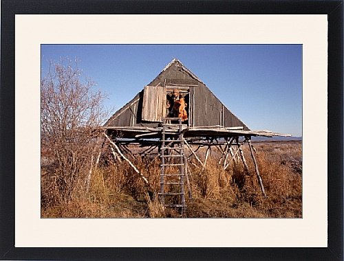 Framed Prints of Traditional Even woman at her hut, used for storage, in Koryakia from ArcticPhoto