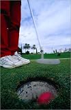 photographie Ball in the hole at the Estepona Golf Course on the Costa del Sol. est disperible en... Image du produit