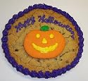 Scott's Cakes 1 lb. Chocolate Chip Cookie Cake with Pumpkin Cookie Purple Trim