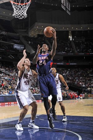 Atlanta Hawks v New Jersey Nets: Marvin Williams and Kris Humphries Photographic Poster Print by David Dow, 12x18