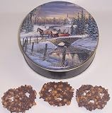Scott's Cakes 1 lb. Milk Chocolate Covered Pretzel with Chocolate Chips & Peanut Butter Chips in a Sleigh Ride Tin