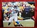 AJ Hawk Autographed Green Bay Packers 8x10 Photo, Proof Photo of AJ Signing for Us.