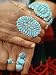 Hands of Navajo Woman Modeling Turquoise Bracelet and Ring Made by Native Americans Photographic Poster Print by Michael Mauney, 12x16