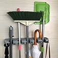 The Strongest Grippers Mop Broom Holder Found Only on Amazon. Items Stay Put Guaranteed Non Slide. Lifetime Guarantee.