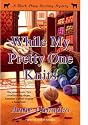 While My Pretty One Knits (Black Sheep Knitting Mysteries)