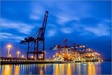 Poster 100 x 70 cm - "Container terminal at the blue hour" by Stefan Kunert - also available in other sizes and as a canvas print