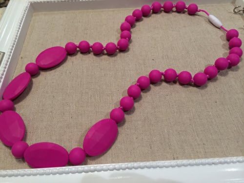 Silicone Food Grade Baby Pink Teething Necklace for Nursing Mom - Baltic Amber will stop the pain, this will keep them busy! Drooling babies will love gnawing on this jewelry that moms wear. Perfect for fine motor skills, sensory, autism