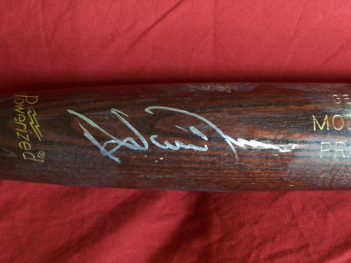 Adam Dunn Autographed Baseball Bat. Proof Photo of Adam Signing for Us.