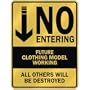 " NO ENTERING FUTURE CLOTHING MODEL WORKING " PARKING SIGN