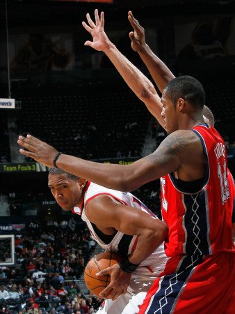 New Jersey Nets v Atlanta Hawks: Al Horford and Derrick Favors Photographic Poster Print by Kevin Cox, 24x32
