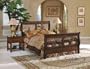 Dark Wood and Iron Queen Sleigh Bed