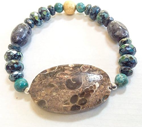 Fossil statement bracelet with large Turritella agate