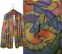 ULRIKE Oblong Chiffon Silk Scarf - Bold spirals of rainbow mid-tones from gold to red, purple, blue, mauve, green, and teal with nuggets of olive in between.