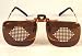Pinhole Clip-ons for People Who Wear Prescription Glasses.