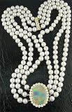 Designer 12.33ct opal & 2.91ct total weight round brilliant diamond 6.5MM triple strand pearl choker set in 18kt gold.