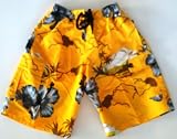 Mens Board Short / Swim Trunks. Elastic waist with board short front closure, slit pockets and side flap pockets. Fully lined. Gold / Beach Floral in sizes S-XXL.
